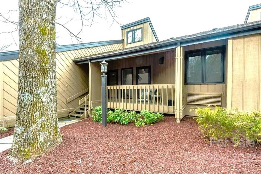 Enjoy the scenic splendor of Rumbling Bald Mountain, a fantastic backdrop to a sweeping view of the golf course – all from your rear deck!  This recently renovated two-bedroom condo sleeps eight, with vacation rental history for 2021 and bookings through 2022 indicating solid investment performance.  One level living with a vaulted ceiling and an open floor plan makes it a charming place to entertain family and friends.  This unit is being offered turnkey, and will be available for showings from 6th June.  Fairway Villas is behind the gates at Rumbling Bald on Lake Lure, which features amenities such as community beach, two golf courses, two restaurants, two pools, gym, spa, and marina, all walking distance around the corner.