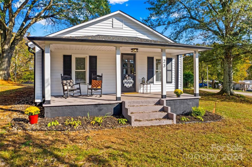 Check out this remodeled adorable bungalow home.  2 BR 1.5 baths, open floorplan, new roof 2024, gutters, countertops, backsplash, appliances, paint throughout, fixtures just to name a few. New 1/2 bath added off of the primary with pocket doors that also accesses the full bath through pocket doors. Sit and enjoy the mornings or afternoons from the front porch or back porch and enjoy the quaint country living on this .97 corner lot.  The property boasts a nice size freshly painted garage/shop/outbuilding.  Make it your own. Attached is an uncovered area that could be used for raising flowers, grilling etc.  Electric is hooked up with a 220 and a 110 outlet. Make your appointment today.  You don't want to miss this amazing home at this price point.  Perfect 1st home or downsizing. Country living at it's finest.
