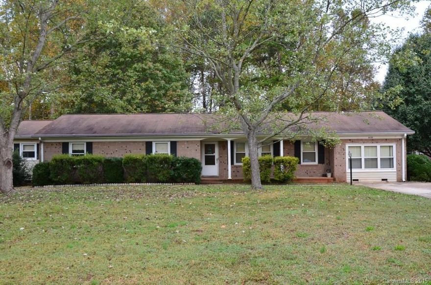 Brick ranch with fenced rear yard. Large family room. New HVAC. Close to I-85. Replacement windows. One outbuilding has power.