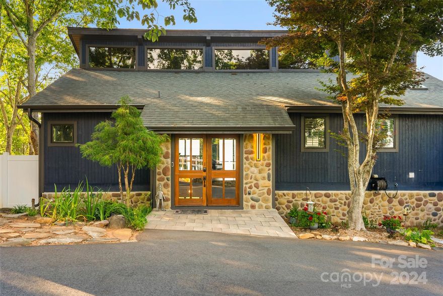 This mountain retreat offers exquisite mountain views! Fully renovated home with a main floor master suite, also includes a very private office. The master bath has been remodeled with a freestanding tub, gorgeous shower, walk-in closet with skylight and custom shelving. Views are everywhere you turn, with two decks with four sliders that allow lots of natural light in! The kitchen has a breakfast bar, quartz countertops, pebble backsplash, and all appliances remain. Downstairs, tons of flexible living area, two additional bedrooms, and bathroom with a zero entry tile shower. With 1.4 acres, fenced and gated at the driveway, you will feel at absolute peace at your mountain top retreat. Other amazing features include: new Anderson doors and windows, new wood Dutch front door, multi-tier water fountain remains, two TVs/Sonos sound bar in living room convey, ring cameras, and septic tank replaced in October of 2022.