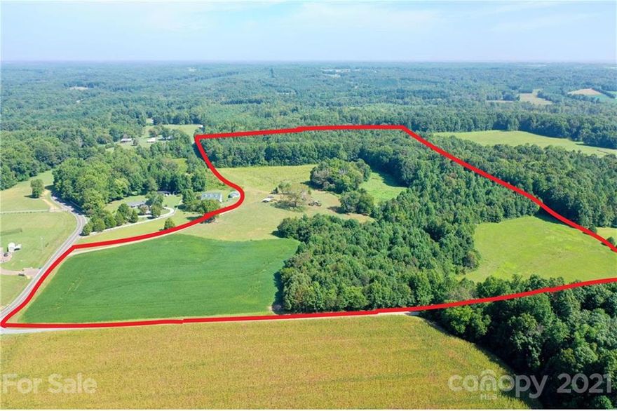 37 acre Farm with Crop land, pasture and some hardwoods. Situated in Rural Davie County property has a lot of potential. Multiple building sites. Old Farm house on Property at no Value. Property partially planted in Soybeans. Cows are currently in the pasture. If you open a gate please close it behind you Fencing is electric. Property is currently in Farm Deferment. Call Listing agent for appointment.