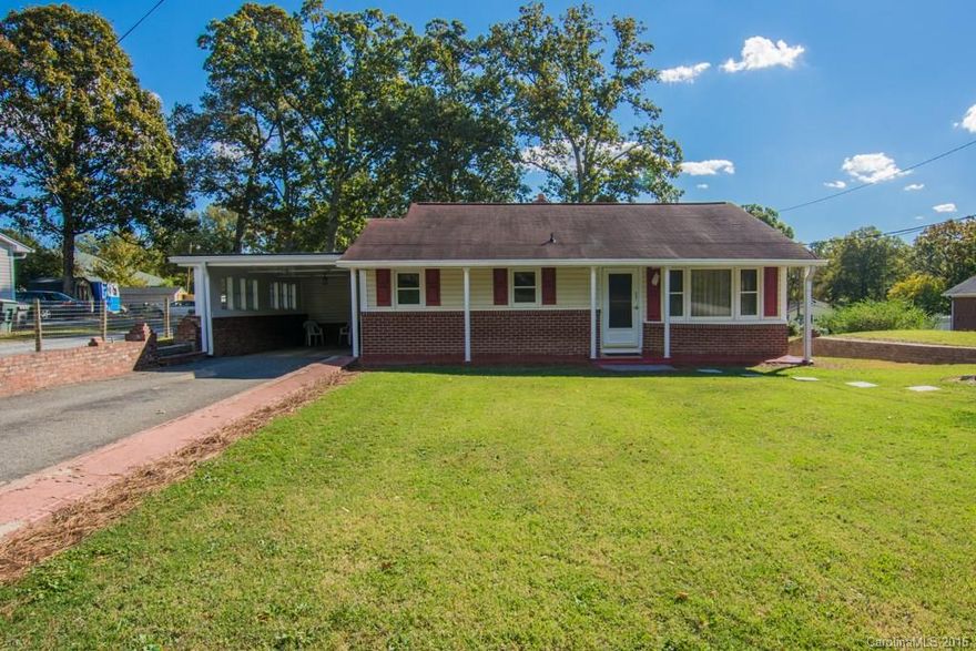 Charming ranch w/ basement on quiet street.  Open floor plan w/ lots of light.  Family-friendly kitchen w/ SS work area by sink. Refrig. and gas dryer remains.  Master bdrm opens to large sunroom. All rooms are spacious.  Freshly painted carport w/ wall of windows for good ventilation.  Backyard patio is great for grilling.  Basement area freshly painted & offers great storage.  Upstairs also freshly painted. Large attic fan-lowers energy costs. Convenient to Hudson Blvd, just off Union Rd.