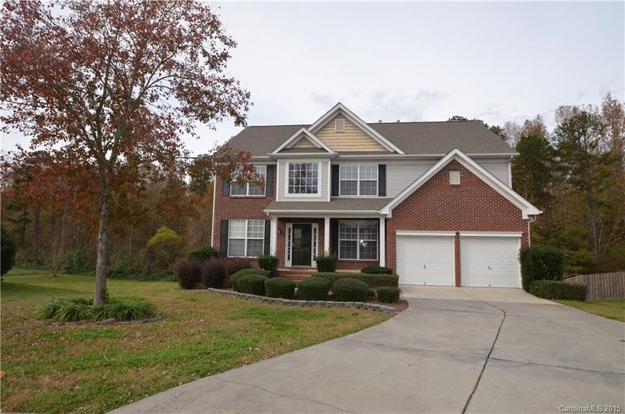 2-story transitional walk-out basement home in Rock Hill, SC, on quiet .44 acre cul-de-sac lot.  5 bedrooms, 3.5 bathrooms, brick front home with 2-car attached garage with concrete drive, rocking chair front porch! Open floor plan, pretty hardwood floors, window blinds! Nice formal Dining Room, large eat-in Kitchen, 2-story Great Room with gas log fireplace! Kitchen has gorgeous American made Dacor luxury stainless steel appliances and there is a deck off of the Kitchen that overlooks the