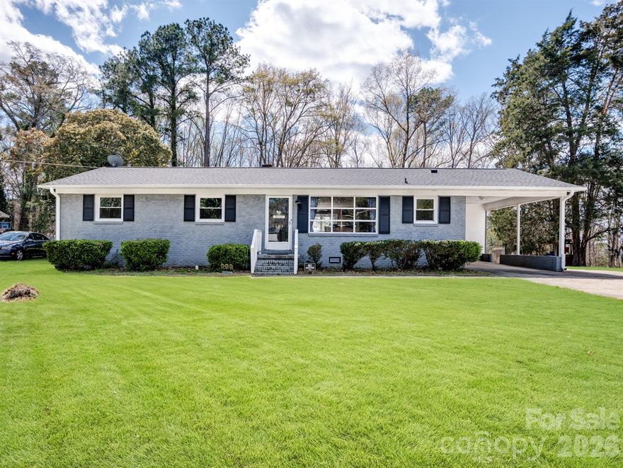 Welcome home to this beautifully updated brick ranch, perfectly situated on over half an acre with a spacious, fenced backyard that offers plenty of room to relax, play, and enjoy the outdoors. From the moment you walk in, you’ll notice the abundance of natural light pouring through the large front picture window, creating a warm and inviting feel throughout. The living room is anchored by a stunning floor-to-ceiling brick fireplace, giving the space both character and a cozy focal point.

The kitchen is open and functional, offering generous counter space and ample cabinetry. Luxury vinyl plank flooring runs throughout the home, with the added bonus of LVP continuing under the bedroom carpet for future flexibility.

This home features three comfortable bedrooms, including a primary suite with two closets and a private bath. The two additional bedrooms are well-sized and share a second full bathroom. 

Outside, you’ll appreciate the attached carport along with a convenient utility closet for additional storage. With updates like new gutters already in place and a setting that offers both space and privacy, this home is ready to welcome its next chapter.