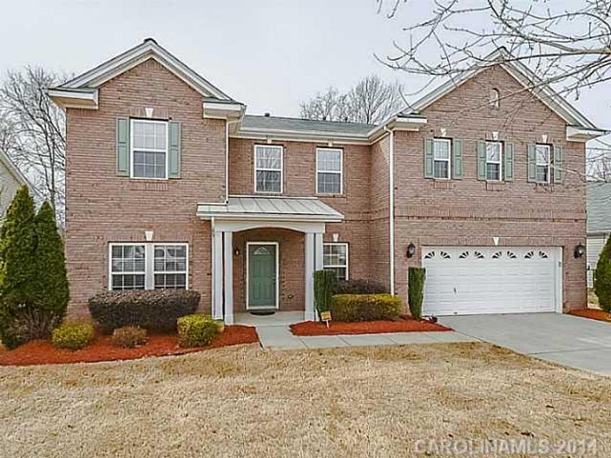 What a family home! Fabulous 2 story on golf course.  Perfect for entertaining w/ open concept,  formal & casual living, fp, hardwoods, crown molding throughout 1st floor, bedroom & full bath down - perfect for office or in-law.  HUGE master w/en-suite, convenient laundry room up.  Additional bonus room.  Seller providing home warranty. Golf Course membership not included in HOA monthly dues..