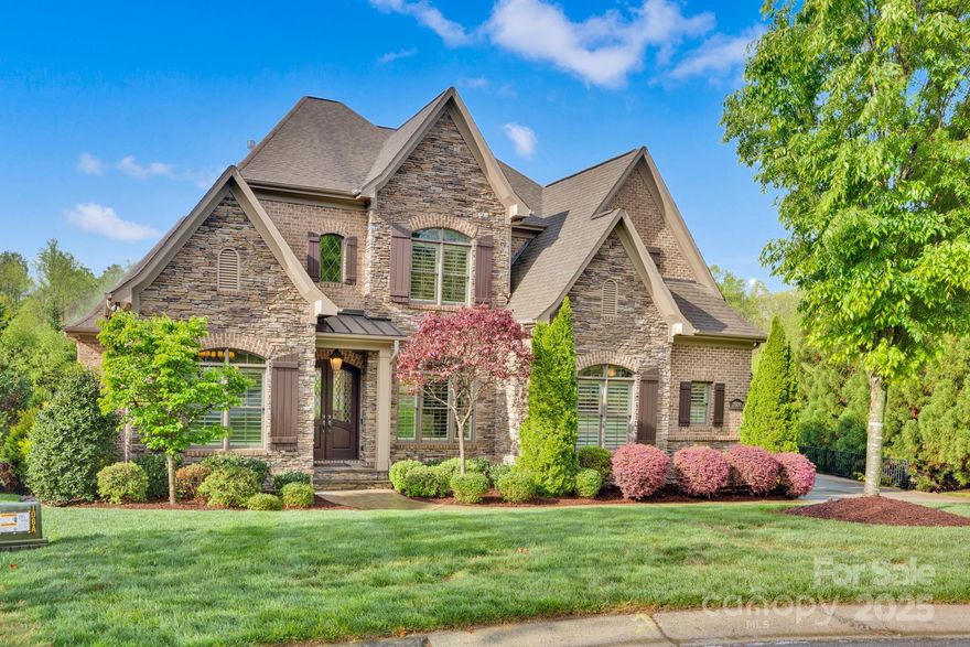 River Run Luxury Living! Elegance meets comfort in this exquisite custom home. Nestled in the highly sought-after River Run community, this residence features a finished basement, a private backyard oasis with a sparkling pool and spa, and a fully equipped outdoor kitchen—perfect for effortless entertaining and serene evenings under the stars. Step inside to discover soaring ceilings, abundant natural light, and gleaming hardwood floors throughout the main level. The primary suite is conveniently located on the main floor, offering a peaceful retreat with spa-like amenities. Enjoy spacious living and dining areas, complete with a cozy fireplace ideal for gatherings. Downstairs, the basement offers a large family room, guest suite, 2 exercise rooms, and ample space for recreation. Upstairs, you’ll find 3 additional bedrooms, offering room for everyone. Located just minutes from charming downtown shops, dining, and top-rated schools, this is more than a home—it’s a lifestyle.