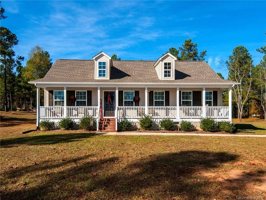 Spend your afternoons rocking on your porch or relax under the covered porch. Spread out on your acre lot and enjoy this gorgeous home. 100% USDA financing available. Split bedroom plan, family room with vaulted ceilings and fan.