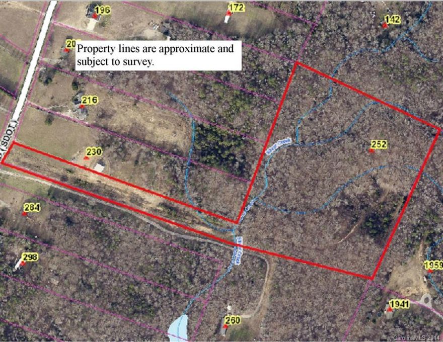 Beautiful tract of land with mature hardwoods and several nice creeks.  There are several nice build sites on the property that create beautiful views of the trees and creeks.  The long driveway creates plenty of privacy from the road and any neighbors.  This property is just minutes outside of the city of York but has the feel of being in the country.
