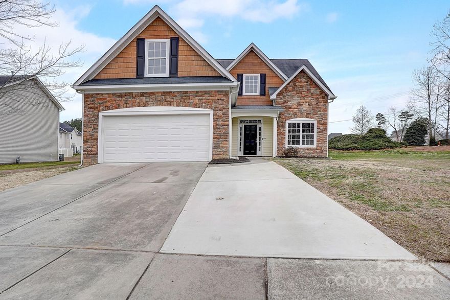 Welcome home to this beautiful 5 bed, 2.5 bath home in Monroe! You will love the neighborhood and the living space this home offers! Main level primary suite, office/formal dining room and updated kitchen features granite countertops and stainless steel appliances. Primary suite offers double sink vanity, walk in shower and soaking tub. Fresh interior paint, new light fixtures and all new flooring throughout w/ Luxury Vinyl Plank in main living areas and new carpeting in bedrooms. 4 large bedrooms on second level and 2 car garage as well! Schedule your showing today!