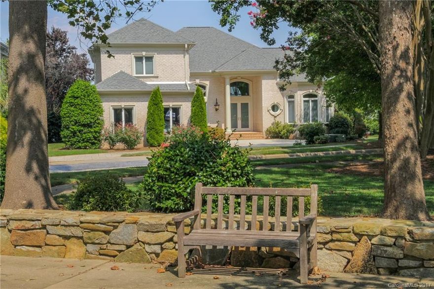 Spectacular Mediterranean style custom home with Intercoastal feel located in the exclusive gated Governors Island quality craftsmanship at every turn includes beautiful millwork and crown detail, lots of windows, hardwoods, columns, soaring ceilings & a gourmet kitchen. Stunning views, open veranda, and designer pool. This home is what Lake Norman living is all about and meant for entertaining family and friends.