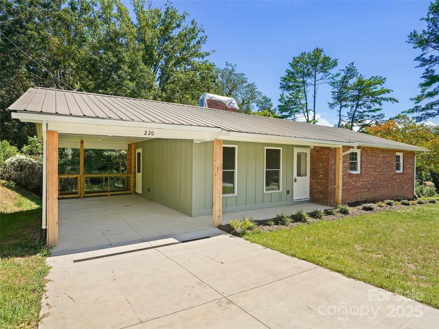 Charming 3-bedroom, 1.5-bath ranch-style home in the heart of Waynesville, just a 10-minute walk to vibrant downtown! Nestled on a level 0.25-acre lot, this updated gem boasts an open kitchen and dining area, perfect for gatherings, plus a formal living room for added elegance. Recent upgrades include a new concrete driveway, modern HVAC, 200-amp electrical service, vinyl windows, updated plumbing, metal roof and stylish fixtures. The full unfinished basement offers endless potential for customization—think extra living space, a workshop, or storage galore. Enjoy the rolling landscape and the convenience of nearby shops, dining, and attractions, with the beauty of Western North Carolina at your doorstep. Move-in ready and packed with modern comforts, this home blends small-town charm with contemporary updates. Don’t miss your chance to own a slice of Waynesville’s magic—schedule a showing today!