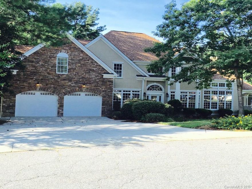 Custom Home with fully finished basement and boat slip in the Prestigious Harbour at the Pointe. Brand New Open Gourmet Kitchen with new granite and stainless. Huge Master Suite with fireplace and wet bar, sitting room and 3 closets.  Luxurious Masterbath w/whirlpool and spectacular open shower. 2nd living quarters with a 2nd kitchen in the beautifully finished downstairs. A walk up 3rd floor could be finished for a media or pool room.Tankless wtr heater. Virtual Tour https://vimeo.com/181663031