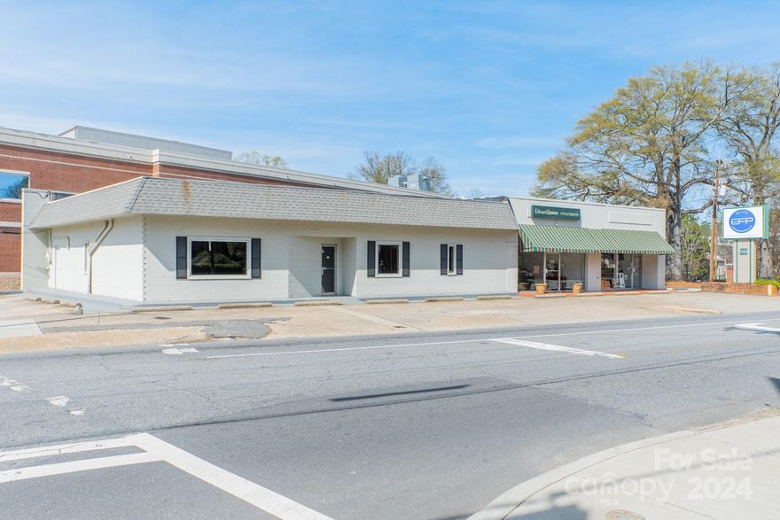 This one story building is ideally located in the heart of Midtown on a corner lot of Caswell and 5th. It is within a major medical corridor including Novant Health Presbyterian Medical Center, Presbyterian Hospital, Charlotte Orthopedic Hospital and Mercy Hospital. The Elizabeth neighborhood offers a dynamic corridor including a grocery store, restaurants and Central Piedmont Community College. It is within walking distance to the LYNX Gold Line's Hawthorne and 5th Station.
The building has 3 suites comprising 6226 SF.  Suite 301 has been totally rehabbed and is vacant. Suite 305 is leased and Suite 307 is leased month to month. The commercial zoning is very accommodating for many uses including retail, office, medical, restaurants, pharmacy. Dream big and call for an appointment to view.
