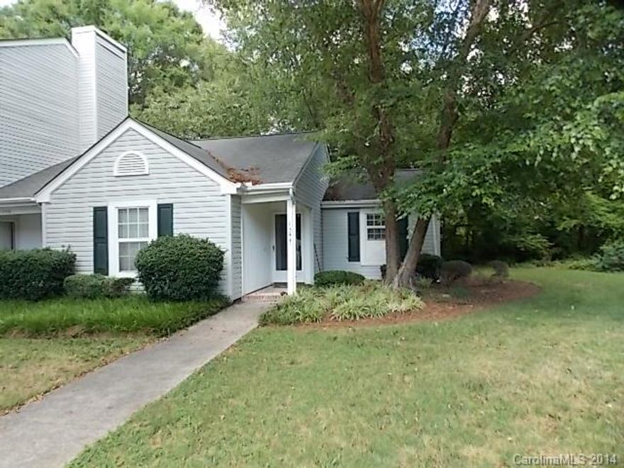 Beautiful 2BR/1BA end unit condo (ground level). Wood laminate floors in family room, hall, and kitchen/dining combo. All appliances remain including refrigerator, W/D, and chest-style freezer in storage room. Nice private patio w/vinyl privacy fencing. Convenient to I-77, shopping, and restaurants.