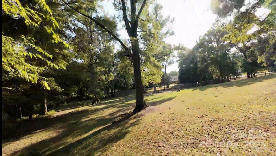 9.727 Wooded Acres  - LOT ONLY– A rare opportunity in a desirable location! Mostly hardwoods with 101 ft of road frontage, at entrance and expands behind existing home. This tract is zoned RMX-20 and offers endless possibilities—estate property, small neighborhood, multi-generational living, or recreational retreat. Peaceful surroundings provide the perfect balance of seclusion and convenience.
The home that shares the same parcel ID is not included in the sale. See pictures for approximate lot lines.