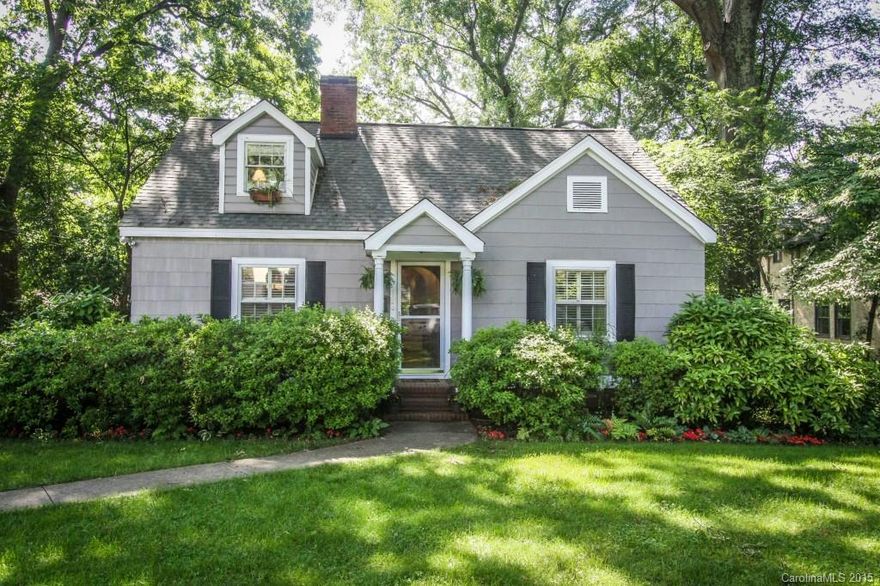 Charming Myers Park 1.5 story home on large deep lot backing up to Greenway.  Spacious Kitchen and Breakfast area overlooks deck and private rear yard.  Hardwood flooring on main level living areas.  Main level full bath with ceramic flooring.  Huge Master Suite and Loft on upper.  Living Room features fireplace.  Dining Room features built-ins.  Close to Uptown, Southpark & Park Road. Updated HVAC (11/2014) & Security.