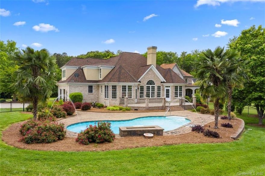 This beautiful home located on a private, gently sloping waterfront lot overlooking the Big Allison creek portion of Lake Wylie. Enjoy your waterfront views while swimming in the saltwater pool or lounging on the paver deck patio. When you are ready to head out on the lake just open the gate and walk to the covered dock. There you can lower your boat into the water and go. This 4 bedroom 2.5 bath home has been completely repainted. It also has newly redone floors, new carpet, encapsulated crawl space, new appliances, and a tankless water heater. Do not miss your opportunity to enjoy the lake life on Lake Wylie.
