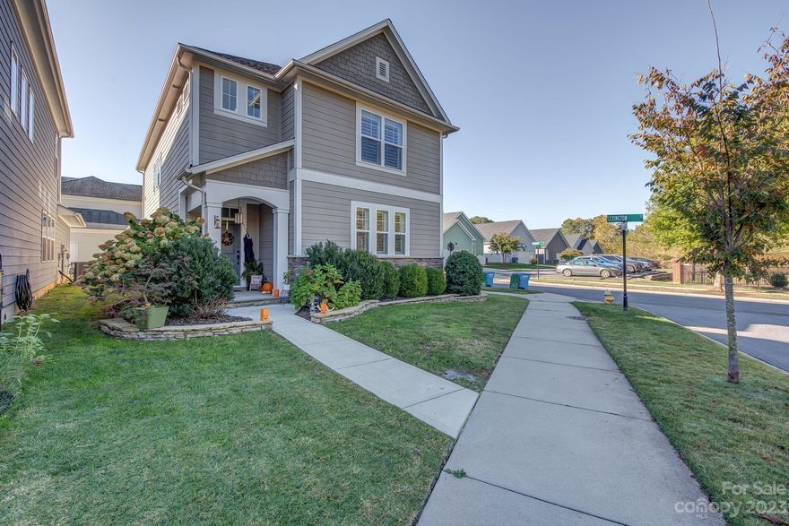 Conveniently located on a corner lot at the end of the street, just across from the dog park, this home has so much to offer! The main floor offers an open floor plan, with kitchen, dining and living areas and easy access to the side yard/patio area. Upgraded SS appliances in kitchen, granite countertops, tile backsplash, farm sink and pantry. Spacious Primary Bedroom includes hardwood floors, seating/desk area, and Primary Bath has a dual vanity with large walk in tiled shower and closet. Don't miss all the upgrades this home has to offer...plantation shutters, drop zone at garage entry, built in beverage fridge, cabinets and built in ironing board in the laundry room, crown molding and custom lighting throughout. Home also includes stacked flower beds, hardscape patio with lighting, fenced side yard, and in ground irrigation. Community features a pool, clubhouse, playground, common areas and a dog park.