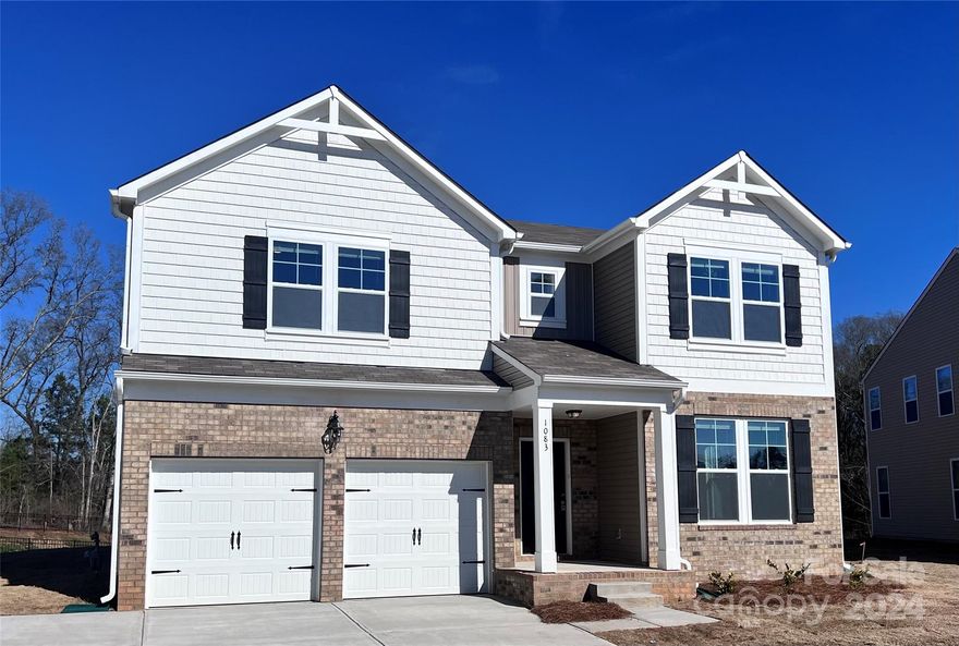 Offering up to $11,000 in closing costs when using a preferred lender. Must sign contract by January 31st, 2024, for incentive. This home has 4BR and 2.5 baths w/ 2-Car Garage and a third car parking pad. The main floor features 9' ceilings, 42" upper kitchen cabinets, quartz countertops, large kitchen island with seating & EVP flooring. Mud Room down with a large Drop Zone. Judges Panels and Crown at Foyer. Family room has a beautiful tile fireplace w/ Oak Mantel. Kitchen features stainless appliances and upgraded cabinets. The flex room on main can be used as a study or den. Stairs feature craftsman balustrades. Primary Bath up has a separate shower and garden tub with ceramic surround and ceramic tile flooring. Community is conveniently located just over a mile from Old Town Rock Hill, Winthrop University and Knowledge Park with many great restaurants, shops, breweries and entertainment options nearby.