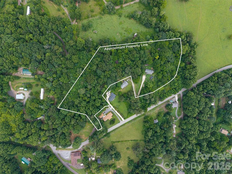 This is a Court-Ordered Sale! Make an Offer to start the Auction! This 6.76 parcel " Approx." has plenty of room to build a home and still keep it privately nestled in the woods with a flowing creek. Property can also be subdivided. 4 Tracts planned. 15 minutes to the airport, 10 minutes to shopping along the south Asheville corridor, and 20 minutes to Downtown Asheville.