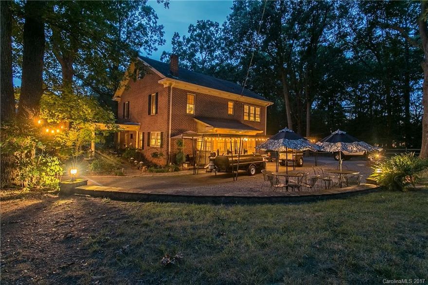 Enjoy a Casual-elegant lifestyle in this meticulously updated & maintained Georgian home. Beautiful original oak floors, plaster walls plus original baths & ceramic floors all look like new.  Solid Brick outside with tall windows & sunrooms to brighten the house. Painstakingly landscaped private setting. Just steps to beautiful Badin Lake with the Uwharrie Mountain Range backdrop & Badin Golf Resort, featuring golf, tennis, pool, dining and lodging.Badin gives the feel of warmth and cozy resort.