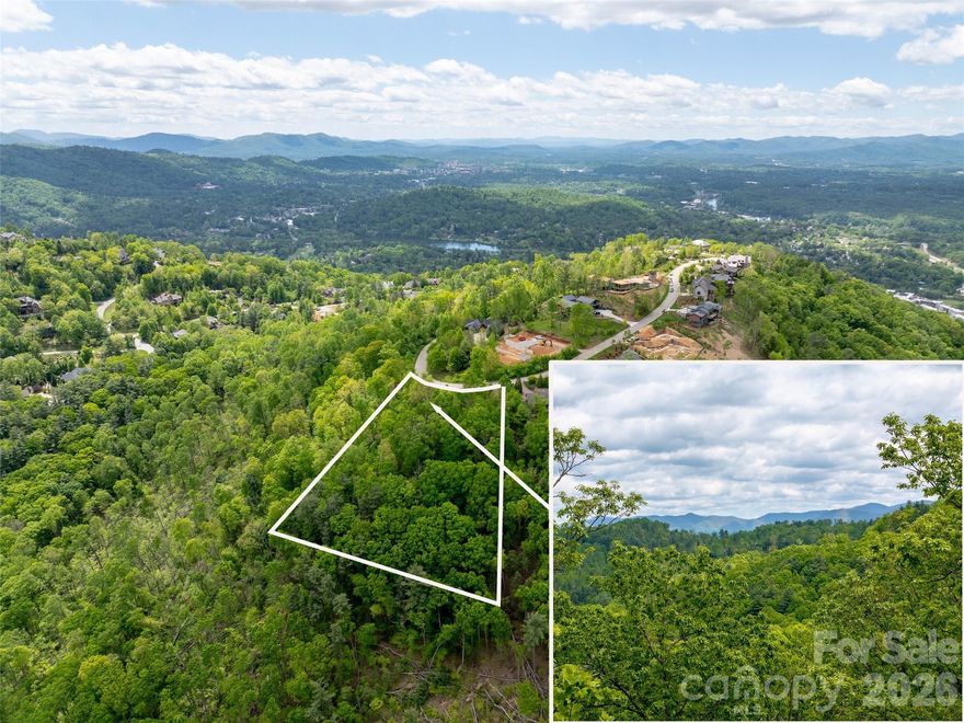 Unmatched layered mountain views & supreme tranquility await you at this 1.72 acre homesite nestled
at 2900 feet in elevation atop north Asheville's premier community - Reynolds Mountain. With access
to city water, city sewer, natural gas, underground power, and high speed internet, this homesite
checks all the boxes. Save time and money by utilizing the seller's architectural home plans which
includes 4,600 square feet and level driveway access from the street to your front door and garage!
Geotech report and boundary survey completed with builder engaged! Truly hard to find such a "shovel
ready" homesite. Excellent location close to all the amenities Downtown, North Asheville and Weaverville have to offer yet conveniently tucked away from the road noise creating a peaceful and serene setting. Reynolds Mountain offers well maintained paved roads for access, private hiking trails, a community pavilion with fireplace/grill, as well as the opportunity for social gatherings.
