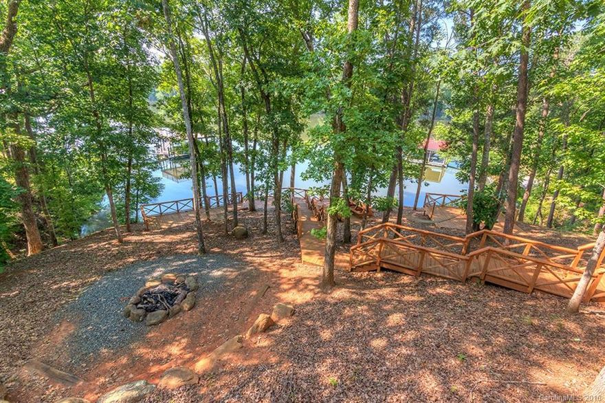 Waterfront lot with 151 feet of shoreline on The Pointe.  Bring your builder or use ours and enjoy the good life in Charlotte's Premier Waterfront Community featuring a championship golf course, 3200 acre lake, and great lakeside recreational area, Marina, Fuel Pier, community pool and tennis courts with other amenities planned. Easy 45 minute drive to either Charlotte or Columbia.
