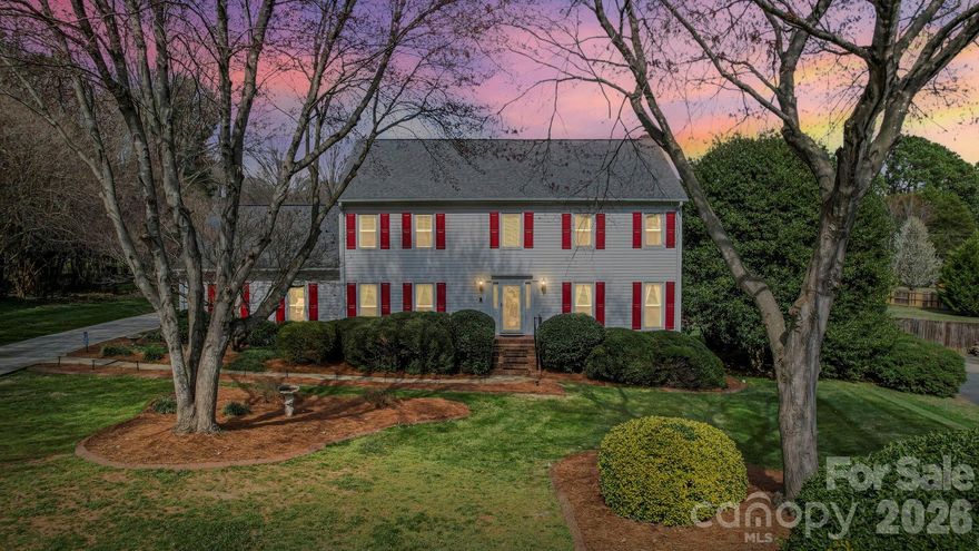 With Everything This Home Has to Offer...we are practically giving it away at this price point! Around 4,000 sq ft with 3,176 sq ft heated living area on a .71-acre lot—priced under $675K. The space, updates, and layout are all here… the only thing missing is the right buyer walking through the door.

Step inside to a two-story foyer with a vaulted ceiling and an elegant chandelier that sets the tone for this impressive home. You'll immediately notice the new LVP flooring throughout, fresh paint, and thoughtful updates at every turn.

The main level offers the flexibility today's buyers need—formal living and dining rooms flow seamlessly into a comfortable family room with a white painted brick fireplace that creates the perfect gathering space. The updated galley kitchen features sophisticated gray cabinetry, granite countertops, stainless steel appliances including a side-by-side refrigerator, and a contemporary glass tile backsplash. Natural light pours into the breakfast area from large windows, making it a space you'll actually use every day.

Upstairs, the primary suite feels like its own retreat—a spacious bedroom with a private sitting area and office space, plus a renovated en-suite bath that's been transformed from dated 90s style into a modern spa-like sanctuary. The renovation includes a luxurious walk-in shower with frameless glass enclosure, dual vanities with white quartz countertops, large illuminated mirrors, and elegant contemporary finishes in soothing gray and white tones. Additional well-sized bedrooms provide room for family, guests, or work-from-home setups.

Unique architectural details include integrated LED stair lighting on each riser—a premium safety and design feature that creates beautiful ambient lighting throughout the stairwell. Accent walls add modern sophistication to the home's neutral palette.

Need even more space? The finished third floor delivers—perfect for a bonus room, media space, gym, or whatever your lifestyle demands, PLUS it is already plumbed for a new bathroom install.

Outside, enjoy a private patio and large .71-acre lot ideal for relaxing or entertaining, four car parking space, plus a rear-load two-car garage for added functionality and curb appeal.

Major system updates already handled means you can move in with confidence and peace of mind.

Homes with this much space, flexibility, privacy, and quality updates at this price point in Mint Hill are hard to find—and even harder to ignore.

?? If you've been waiting for the right opportunity, this is it. Schedule your showing today before someone else sees the value first.