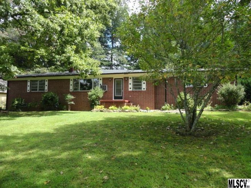Lots of Potential!!! Seller will offer a $1000 credit for carpet/paint or closing cost. Home has a spacious living/dining area which leads out to the great back covered porch area. The porch is great of those outdoor morning relaxation times or outdoor evening meals. The kitchen has good counter space and cabinet space. A dinette table can be placed in the room or a movable island could be used. A den off the kitchen could be a multipurpose space: computers, reading room, etc. A spacious laundry area is conveniently located on the main level. The 1/2 bath for visitors is easily accessible. The upstairs has the feel of 2 masters with both bedrooms having their own bath. These 2 bedrooms are very spacious as well. Downstairs has 2 rooms which have been used as bedrooms but could be a den space and a bedroom. The home also has a large open work area in the basement. The owner has just refreshed with paint on inside and will be on outside as well. A must see at this price. $114900