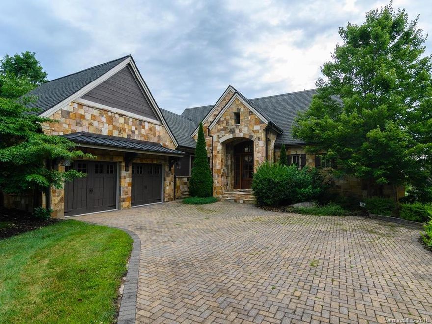 Enjoy long distance views of the mountains from your European style home on the golf course at The Cliffs of Walnut Cove. Slide away doors afford more outdoor living space contiguous to the great room and kitchen. Patio fireplace with built in grill.