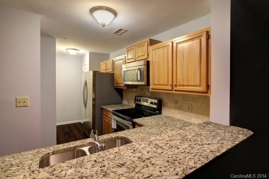 Completely renovated Unit in a great location with lake access. Close to down town Davidson, highway, shopping, and dining. This unit is better than new, including Stainless steel appliances, granite counter tops, tile backsplash, new hardware, fixtures, Pergo flooring, and fresh paint throughout. Main floor features living room with; dining area; The master suite bathroom features a garden tub, and large walk in closest. The second master includes a full Jack and Jill bath, and large closet.