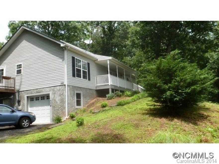 REALLY NICE!  Off-frame modular (in many cases better than on site stick built!) Walking distance to downtown Waynesville. Open concept greatroom,kitchen,dining w/ e-z access to private back deck and a covered frontporch.Entertaining perfection for family and friends! High quality attractive laminate floors, tiled kitchen floors, cozy bedrooms and nice baths. If Waynesville is your destination, you might have just found home at affordable price!