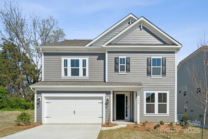 MLS#4225499  New Construction - Ready Now! The Waverly floor plan at Walden offers an expansive, open-concept design with thoughtful touches throughout. The first floor is bright and inviting, featuring a spacious gathering room that flows into the gourmet kitchen, complete with a food prep island, butler’s pantry, and large walk-in pantry. A sunroom off the gathering room adds even more space to relax, while a first-floor guest suite with a full bath provides comfort and privacy. A convenient mudroom off the 2-car garage keeps things tidy with coat storage and access to the powder room. Upstairs, the owner’s suite is a true retreat, boasting dual walk-in closets, a spa-inspired soaking tub, an optional oversized shower, dual sinks, and a private commode. Three additional bedrooms, two full baths, and a spacious loft complete the second level. Structural options added include: first floor guest suite, sunroom.