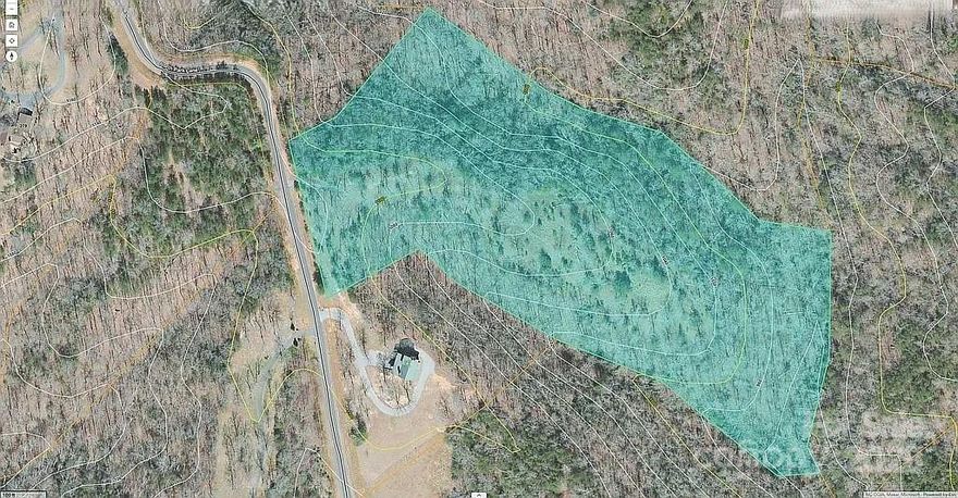 12.33 Acres in Lake Adger – Private Mountain Property with Pasture, Privacy & Expansion Potential 

If you've been looking for a peaceful place to build your dream home or mountain getaway, consider this beautiful 12.33-acre property in the Lake Adger community of Western North Carolina. Privacy, views, and potential to create something truly special.

Located on a quiet, paved cul-de-sac road with minimal traffic, this ridgeline property features partially cleared land, ideal for potential horse accommodations or simply enjoying open space. With at least two potential home sites, this land provides flexibility to create your ideal mountain residence or getaway. An expired septic permit is on file, and the property has easy access to the community's walking trails. The Lake Adger boat launch is just minutes away, opening the door to fishing, kayaking, and peaceful lake living.

For those seeking additional space, an adjacent 5-acre parcel is currently available for purchase from a separate seller, offering a rare opportunity to expand your private estate to over 17 acres.

This community is known for being low-density, well-kept, and environmentally sensitive. It's a place where you can truly enjoy nature, clean streams, protected green spaces, wildlife, and mountain views, all while still having the benefits of good planning and a respectful, like-minded community.

Located in Polk County, NC,  just 15 minutes to Tryon and Lake Lure, and within easy reach of Asheville, Hendersonville, and Greenville, SC.

Property Highlights:

- 12.33 acres of ridgeline land in Lake Adger
- Partially cleared pasture with potential for horses
- Two+ potential home sites
- Expired septic permit on file
- Access to community walking and equestrian trails
- Lake Adger boat launch just minutes away
- Quiet, paved cul-de-sac road location with low traffic
- Adjacent 5 acres available from separate seller

Lake Adger is an upscale, low-density, environmentally conscious community nestled in the Blue Ridge Foothills. It features 14 miles of shoreline, private boat access, over 13 miles of horse friendly community trails, and a strong focus on conservation and quality of life. Residents enjoy privacy, outdoor recreation, and a close-knit sense of community in a setting that's peaceful, scenic, and protected for generations to come.

Don't miss this rare opportunity to own acreage in one of Western North Carolina's most desirable lake communities.

If you're serious about finding a private, buildable piece of land in a well-regarded mountain community, this could be the one.