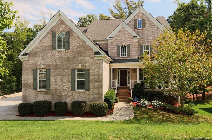 Ease of maintenance, well-maintained 4 bedroom rocking chair front porch home featuring the convenience of a guest BR on the main. The stunning two story GR with lots of natural light is open to the large oversize kitchen adorned w/granite. Main floor also boasts a formal LR & DR. Upstairs is finished with the same charm & includes the MBR, 2 addt'l large bedrooms & a spacious bonus room. Plus, downstairs walkout could easily be finished to add an addtl 1500 sq ft. New upper A/C Unit w/warranty.