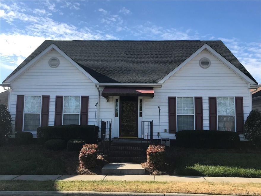 Beautiful 2 Bedroom and 2 1/2 Bath Patio home in Lake Park's Garden District. This home enjoys a lovely view of one of the neighborhood lakes.  Entry foyer w/hardwoods leads through decorative arch to spacious Kitchen w/42" oak cabinets & lots of counter space. Dining area w/hardwoods opens to cozy family room.  TWO Master bedrooms w/ walk-in closets!!  Each Master has a connecting bath w/large vanity & linen closet.  Sliding doors in living area open to stone-accented patio & lovely fenced yard.  Attached 2 car garage has attic pulldown for additional storage and new garage door opener in 2016.  Lawncare by HOA.   2' blinds on most windows.  Roof and AC were replaced within last 5 years. Lake Park has town center shops, landscaped parks & common areas, several beautiful lakes, playgrounds, basketball & tennis courts, picnic area and neighborhood pool  & clubhouse.