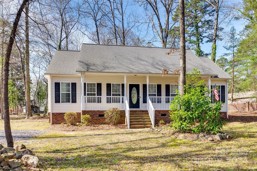 Nestled within the prestigious Rock Hill Country Club neighborhood and conveniently located just minutes away from I-77, this delightful ranch home offers an ideal combination of comfort, convenience, and style. The home features fresh paint, hardwood floors, updated primary en suite, split floorplan and beautiful granite counter tops in the kitchen and primary bath. Enjoy the evenings sitting on the rocking chair front porch or entertaining from the back deck overlooking a huge level back yard.