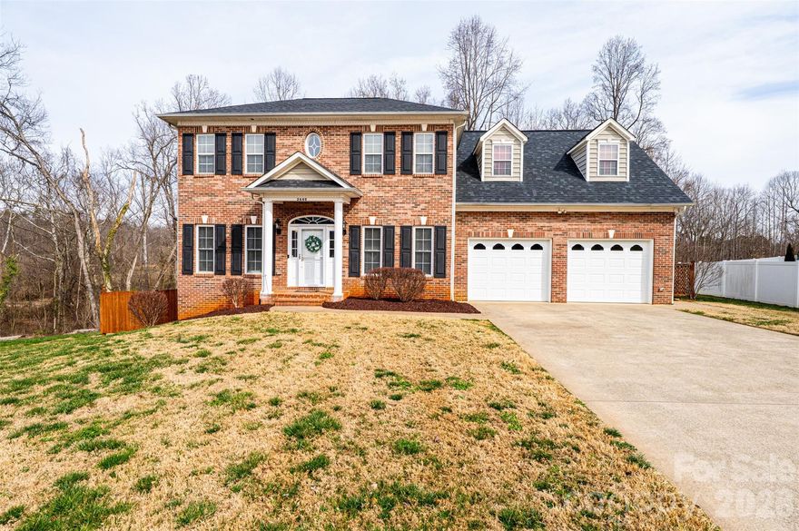 OPEN HOUSE Sunday 3/1 from 2pm – 4pm.  Beautiful 4BR/2.5BA with finished basement on cul-de-sac in Mountain View area of Hickory, NC.  Main floor has original hardwood floors throughout.  Cozy family room with gas logs that lead into spacious kitchen with quartz countertops, stainless-steel appliances and breakfast nook that looks out to large level backyard.  Off the kitchen is a formal dining room perfect for holiday dinners.  Upstairs is carpeted throughout.  Good size primary bedroom with walk in closet and dual vanity, shower and garden tub in primary bathroom.  Three other bedrooms down the hall…..one could be a bonus room if preferred.  Another family room/den in basement along with either an office or another bedroom.  Storage closet in basement.  Kayak and/or tube down the river that’s short walk through your backyard.  Roof 2020.  HVAC (2025 downstairs/2021 upstairs).
