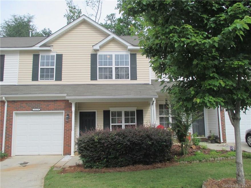 Lovely townhome in Fort Mill School District.  Located on a cul de sac and backs up to trees. It has an open floor plan with a fireplace in the family room, eat in kitchen with door to patio.  2 spacious bedrooms, loft, sitting room/office and two full baths upstairs.  Close to 77 for an easy commute. There is a community pool to enjoy as well.  This is a must see !!!!