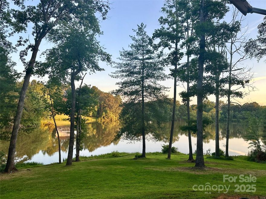 NEW PRICE! Water front lot on Gunpowder Creek Lake. Gently slopping 2.453ac facing south w/approx. 800ft of water front, privacy, NO HOA & NO restrictions. Site build, single wide or doublewide manufactured home, modular allowed. New well installed in 2022. Property has been partially cleared, graded for building site with gravel circle drive. Septic permit on file. Ready to build. Kayak/paddleboard launch area on property. Partial owner financing available. Storage building and camper not included.