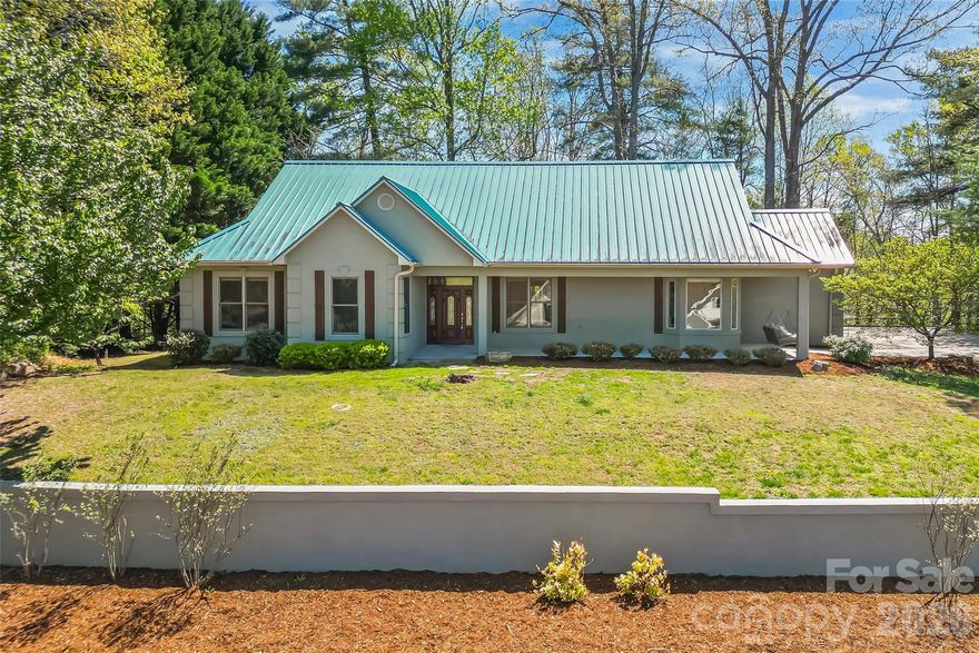 If you’ve been looking for space, privacy, and proximity to Lake James… this one checks all of it. 

Set just second row from the lake and located in one of the most sought after developments on Lake James, this 4-bedroom, 3-bathroom home offers stunning views of Table Rock and the surrounding Blue Ridge Mountains. 

Upstairs, the main level living space feels open but intentional. Tall ceilings, built-ins, and a dining area framed by classic columns. The kitchen sits just off to the side with windows made for slow mornings, quiet conversation, and a peaceful start to the day.

Both the living room and primary suite open onto the newly updated TREX deck, extending your living space outdoors and  creating an easy indoor-outdoor flow. 

The primary bedroom features an en-suite bathroom with a dual vanity and glass walk-in shower. An additional full bath, laundry room, and two extra bedrooms complete the main level. 

Downstairs, flexibility really shows with a full second setup. A spacious living area, second full kitchen, dining space, bedroom with ensuite bath, craft room, a separate bonus room used as a bedroom, and walk-out access. Ideal for guests, multi-generational living, or potential income. 

A rare opportunity to enjoy privacy, functionality, and mountain living just moments from the water. 

This is the kind of place you look forward to coming home to.