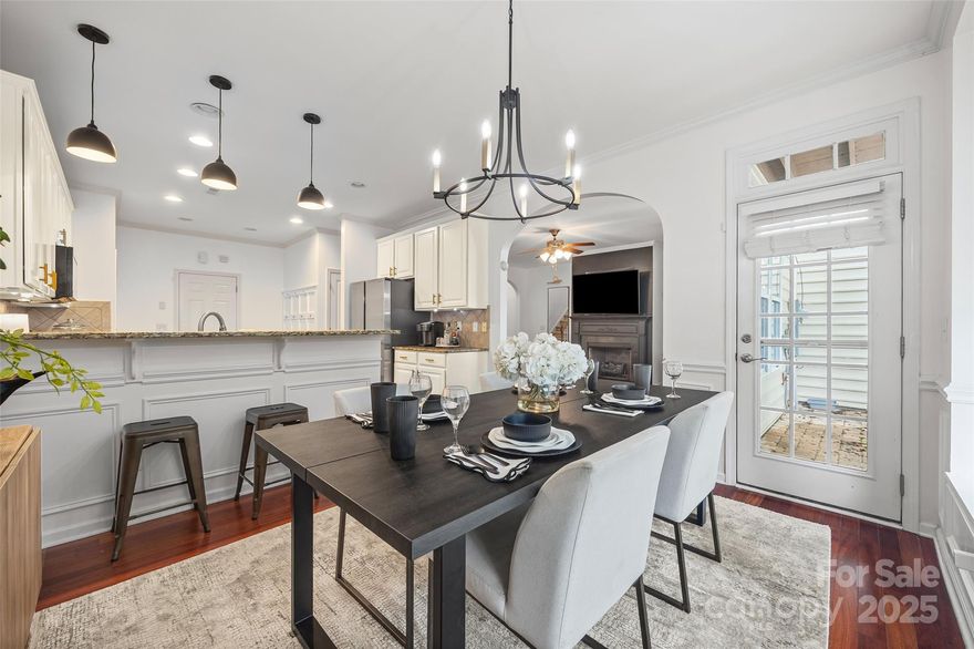 Rare find in Cobblestone with a private backyard and two-car garage! This move-in ready townhome features an open main level with hardwood floors, granite kitchen with stainless appliances, and a cozy fireplace. Entertain in your oversized dining/morning room with cozy window seat. Upstairs, the primary suite shines with dual vanity, garden tub, separate shower, and a private balcony perfect for morning coffee or evening sunsets with a good book. Two additional bedrooms, a large loft, and upstairs laundry offer flexible living. Outdoor space sets this home apart—ideal for relaxing, pets, or entertaining. Fully fenced, ample grass space, and private view. Convenient to Indian Land schools, and steps from IL middle and intermediate, shopping, and dining, this home blends comfort, function, and lifestyle in a sought-after location. Target and Costco coming soon!