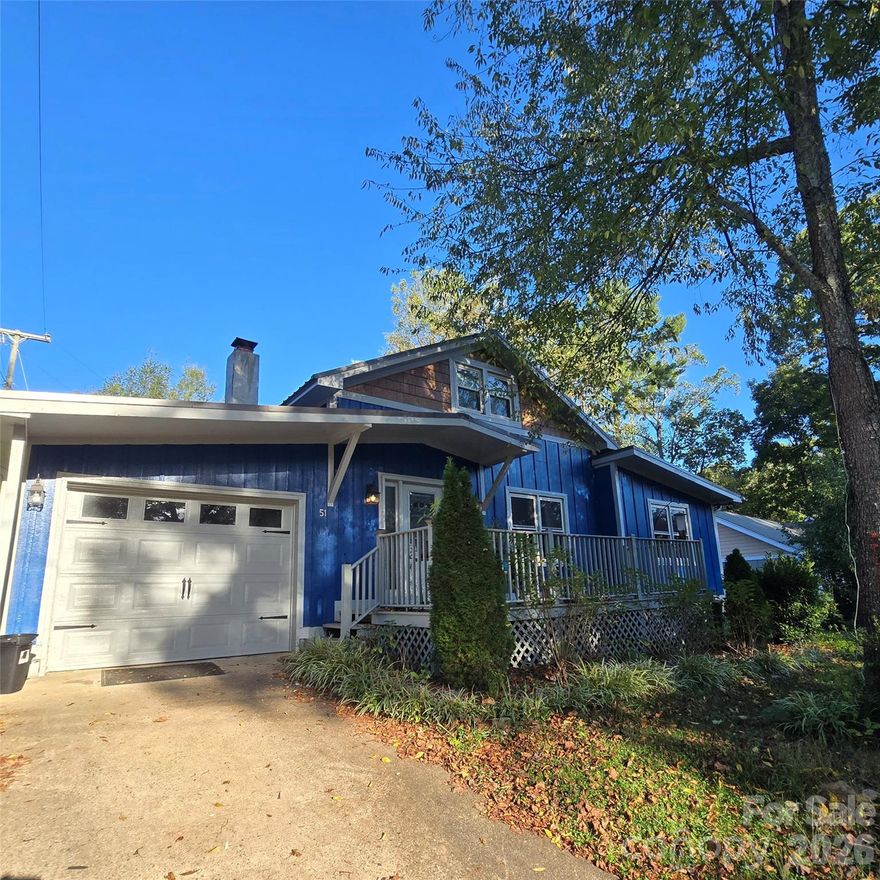 Priced below appraisal within 12 months at $505,000. Assumable mortgage at 3.375% - inquire for details. Video Available. 

Updated Arts and Crafts home in highly desirable South Asheville. This 3-bedroom, 2-bath home offers modern comfort with timeless character, featuring an open floor plan, hardwood floors throughout, and abundant natural light. The primary suite is on the main level with a spacious bath and a sitting area filled with sunlight. Second bedroom on primary level, with 3rd on upper. Newer metal roof and Solar panels for reduced or no electric bills. Solar panels paid off at closing - no need for buyer to take on contract.

Upstairs has two rooms, with generous storage, ideal for guests or a home office. Upper room has Juliet balcony over the back terrace. The kitchen features stainless appliances, granite counters, and an easy flow to the dining and living areas with a charming fireplace.

Enjoy morning coffee on the covered front porch and evening barbecues on the back terrace overlooking the large fenced almost flat yard. Go out to the many restaurants a few minutes away when you don't feel like cooking. The main-level garage provides convenient parking and storage, plus there’s an additional storage shed out back. Space to park an RV - or your guests at the front!

Located just a few minutes from shopping, restaurants, coffee shops, and Jake Rusher Park, this home offers quick access to both Sweeten Creek and Hendersonville Road, making every commute and errand simple.