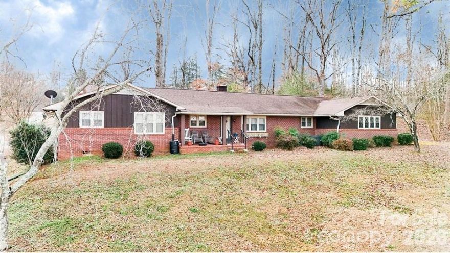 A Beautifully maintained 3-bedroom home offering 2 full baths and a half bath, with spacious bedrooms and generous closet space throughout. This warm and inviting home features a bright kitchen with a new over the range microwave. An adjoining dining area, a relaxing sunroom, and an expansive family room accented by a gas log fireplace. A large laundry room with sink. The flexible floor plan provides even more living options with a bonus den and a welcoming sitting area—perfect for an office, playroom, or additional relaxation space.
Outside, enjoy a two-car carport, fenced backyard ideal for pets, a sizable storage shed for equipment, and a paved driveway. The home sits back from the road on a gentle hill, offering added privacy and curb appeal. Conveniently located near downtown Forest City, with restaurants, shopping, and schools close by, plus easy access to Hwy 74. This charming property truly offers comfort, convenience, and space—ready for its next owner to love.