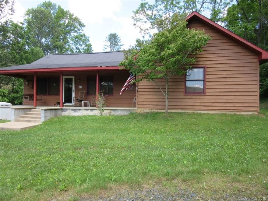 6.2 ACRE HORSE FARM WITH RIDING RING AND 4 STALL BARN WITH FEED AREA, TACK AND WASH AREA AND ALL THE EQUIPMENT. There is a 2 bedroom house with cedar siding, extra large rooms, stone fireplace and large laundry/mud room. Delightful front porch and screened back porch. There is also a hay barn and small creek along one boundary.