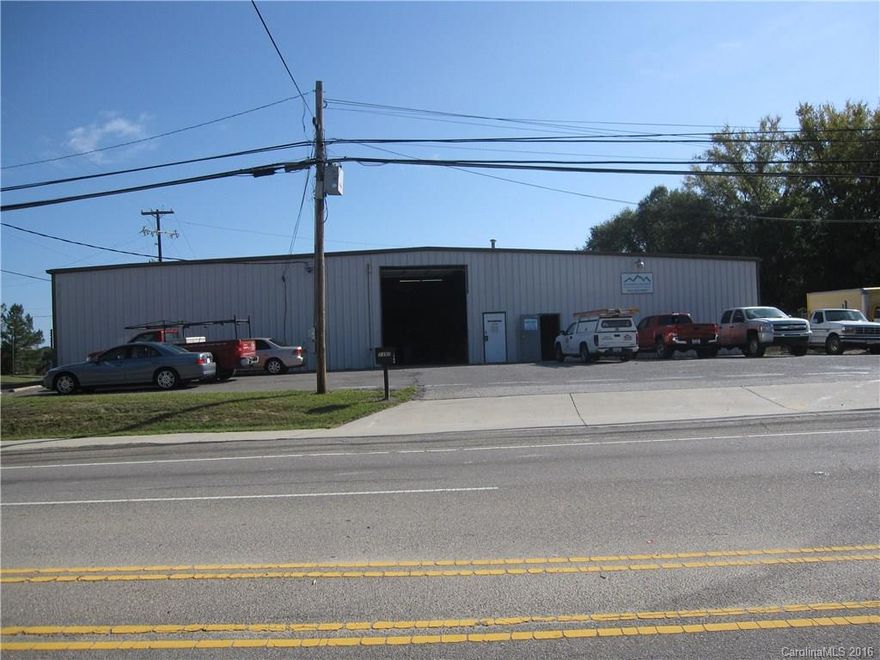 22,000 sf open space W/Sprinkler system! Convenient location, ideal industrial, warehouse, lt mfg, storage. High voltage (3 phase) to warehouse.Separate elec meter and access bays could allow for division and lease out to smaller space users.