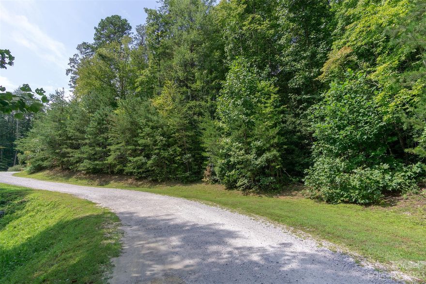 Two fabulous lots near downtown Old Fort that are protected by a few reasonable C&Rs but no HOA, HOA dues or gate. Public water/sewer available. I-40 & US/NC Hwy interchanges all within 5 minutes or less. Take Curtis Creek to the Blue Ridge Prkwy - about 15-20 minutes with Mt Mitchell State Pk only another 8 prkwy miles. There's enough slope to provide views of mountains in distance and not steep, creating extra cost/complexity while developing. Gentle slope where you'd want to place your foundation AND large enough (1.61ac) to provide sufficient privacy not usually found this close into town. Wooded and quiet neighborhood. Build on Lot 7 and keep option open for selling Lot 5 or as a gift to loved one...
