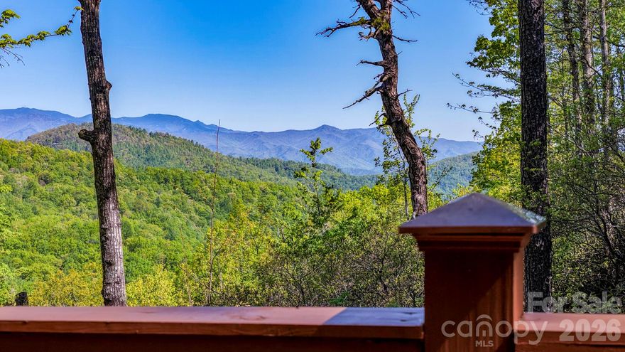 SPECTACULAR MOUNT MITCHELL VIEWS from this nearly new 2 bedroom, 2 bath, mountain cabin outside Black Mountain, NC.If privacy and solitude is what you are searching for, this mountain getaway may be just the right place for you. You'll love the open-air floor plan with vaulted ceilings and nature out of every window. If the power goes out, there's no worries here with a 24KW whole house generator and plenty of propane storage. You will also enjoy the full-length covered porch and huge deck boasting long range mountain views. A must see at only $449,000.