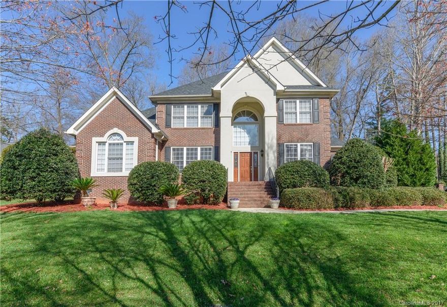 Located in one of Fort Mill's most desirable communities of established homes & larger lots.  Here, well built homes are not a thing of the past & this one has all the “I wants” you’ve been looking for . . . full brick, custom built, 3 car garage, master & 2nd BR down, den, loft, bonus . . . the list goes on.  Don't miss your chance to enjoy summers on the covered porch surrounded by generous trees & a flat backyard that can accommodate a pool, trampoline or swing set.  This home demands action!