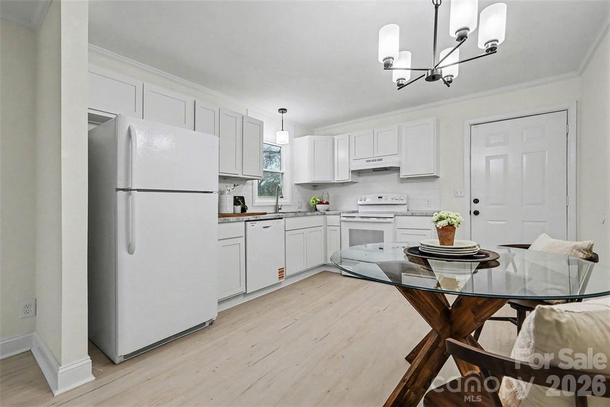 Set on nearly one-third of an acre, this fully renovated ranch-style home blends modern updates with flexible spaces designed to adapt over time. The interior has been thoughtfully refreshed with new flooring, updated fixtures, fresh finishes, and a bright, open feel throughout the main living areas.

The suite-style third bedroom, accessed through an adjacent bedroom, offers versatility as a home office, dressing room, nursery, or creative space, allowing for intentional use beyond a traditional layout.

The property also includes an attached, unheated finished bonus studio/apartment with private exterior access, providing excellent flexibility for a studio, workshop, hobby room, home gym, or storage. This space is not included in the heated living square footage and is classified as non-living area; buyer/buyer’s agent to verify intended use and any future conversion options.

Preferred lender offering up to $2,500 in buyer closing cost assistance when financing through lender. Terms and conditions apply. Buyer not required to use preferred lender.
Outside, enjoy a spacious fenced backyard featuring a dog kennel and storage shed—both included, offering added convenience for pet owners, hobbies, and additional storage. The peaceful setting provides privacy while remaining conveniently located just minutes from Hwy 74 and Gardner-Webb University, with easy access to shopping, dining, healthcare, and everyday amenities.

A thoughtfully updated property offering flexibility, functionality, and room to breathe—ready to support a variety of lifestyles.